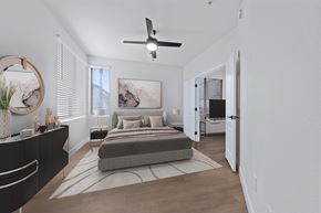 Phoenix apartment for rent - a bedroom with a bed and a ceiling fan